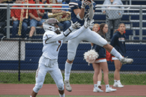 Frankie Provenzale makes a touchdown catch against Harrison on Oct. 23, 2021. The Eagles fell to the Huskies, eliminating them from playoff contention.