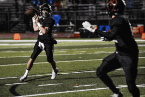 Jax Colacicco looks at an open receiver on Nov. 12, 2021. Colacicco threw for two touchdowns in Tuckahoe’s Nov. 19 game against Greenwich. Photo/Mike Smith