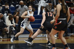 Julia Vesey looks for an open teammate against Tuckahoe on Dec. 4, 2021. Vesey was named tournament MVP as the Eagles topped the Tigers 44-42.