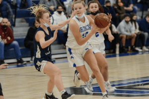 Kiki Tormey drives past a Putnam Valley defender on Feb. 26, 2022.