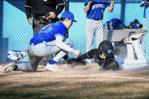 Rye Neck's Jacob Wesemann scores the tying run during a game against Bronxville on April 2, 2022. The Panthers scored four times in the bottom of the 7th inning to top the Broncos in a rematch of last year's Section I Class B championship game.